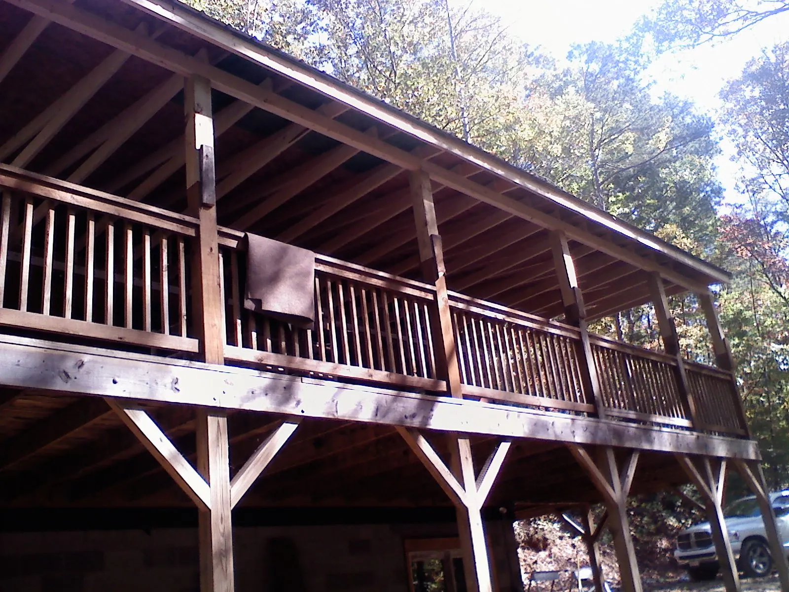 Timber framing under a new elevated porch and deck — Roof Leak Repair in Jemison by Roofing Brothers